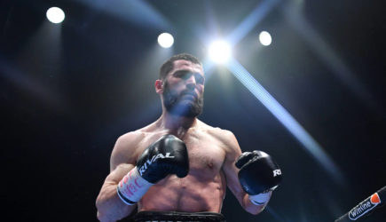 Российский боксер объединил три титула чемпиона мира